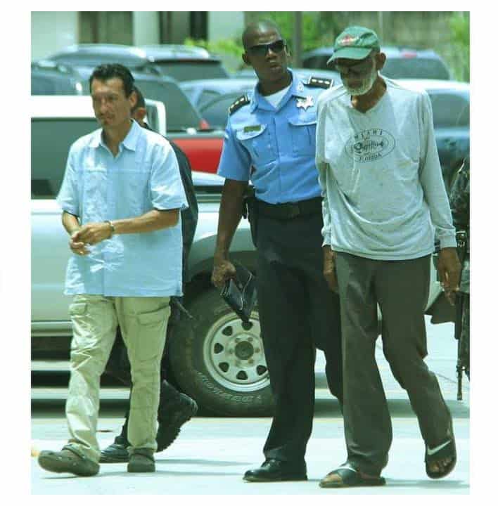 Image of a Honduran self-proclaimed herbalist and healer, Dr. Sebi Sea being arrested