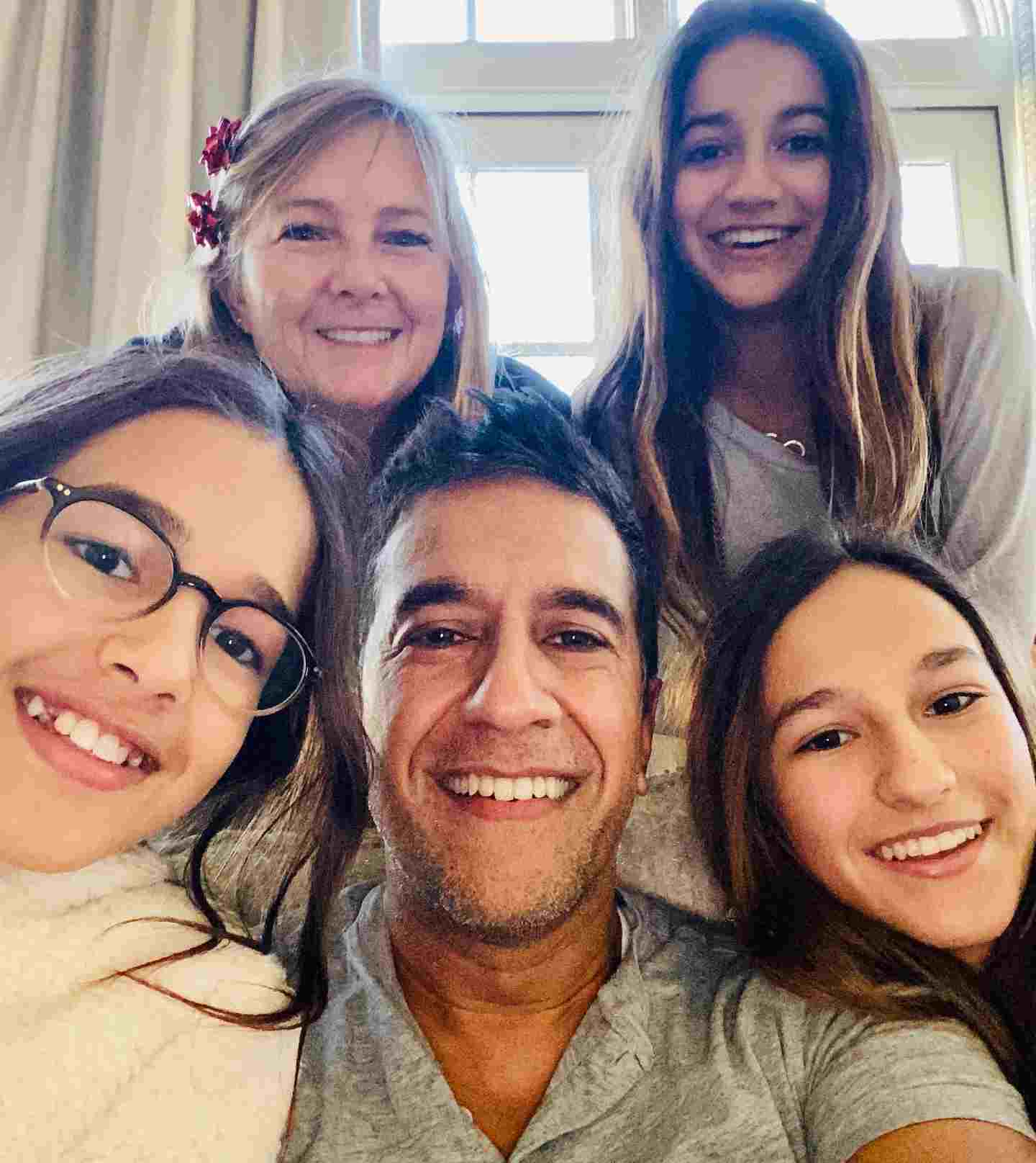 Image of renowned neurosurgeon, Dr. Sanjay Gupta with his family