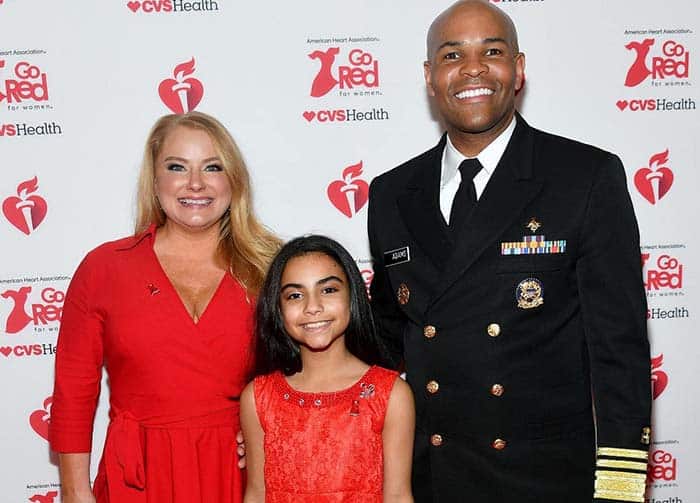Image of Jerome Adams and his wife Lacey Adams and daughter.